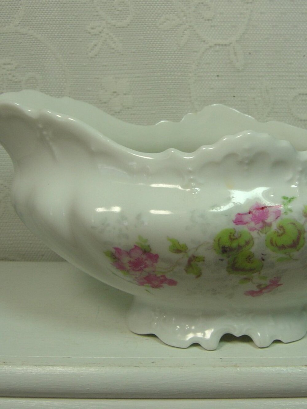 Vintage white gravy boat with pink flowers